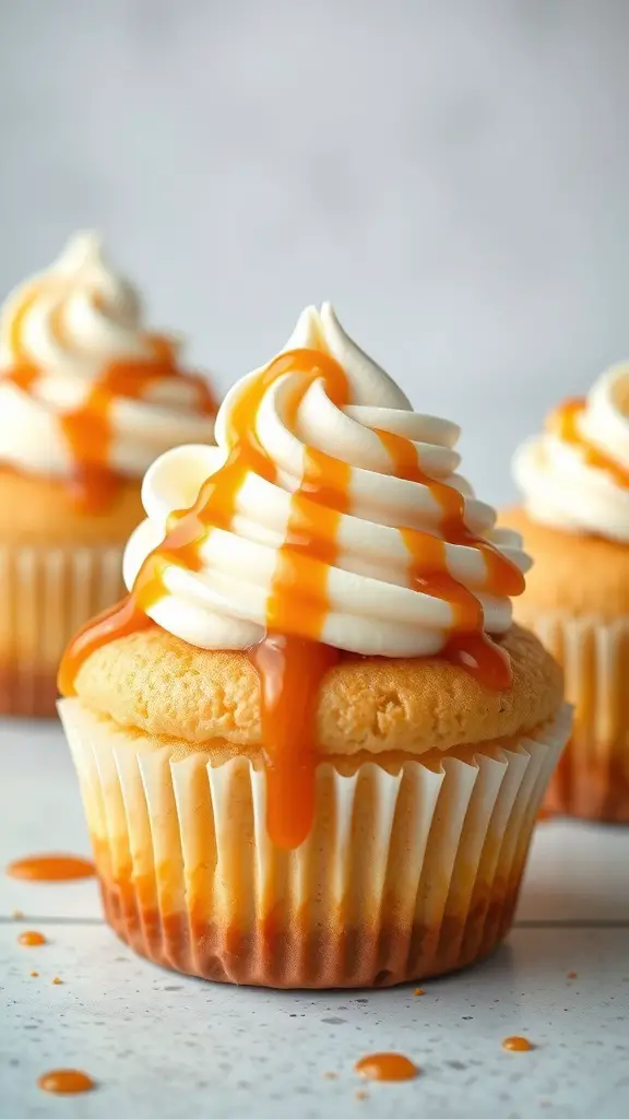 Close-up of caramel pudding cupcakes with creamy frosting and caramel drizzle