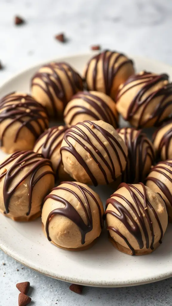 A plate of peanut butter fat bombs drizzled with chocolate.